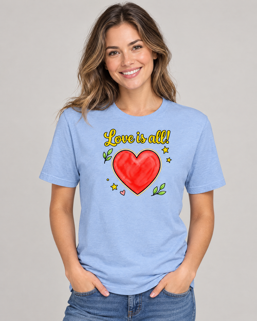 Woman wearing the Love is All! adult tee in heather blue with the large gold script and red heart print on the front